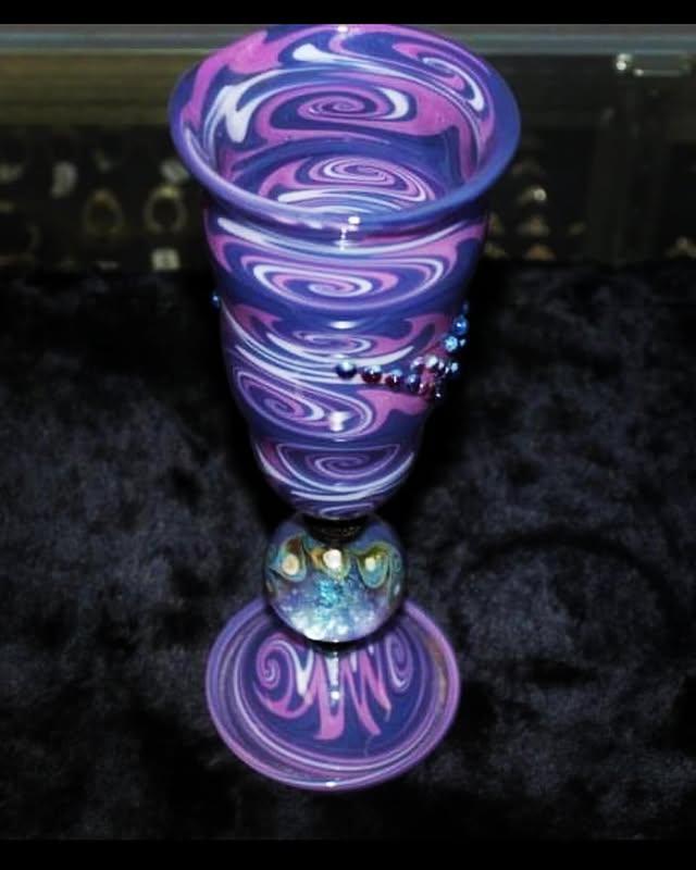 Purple, pink, and white swirl goblet with a dotted waist and a millefiori knop